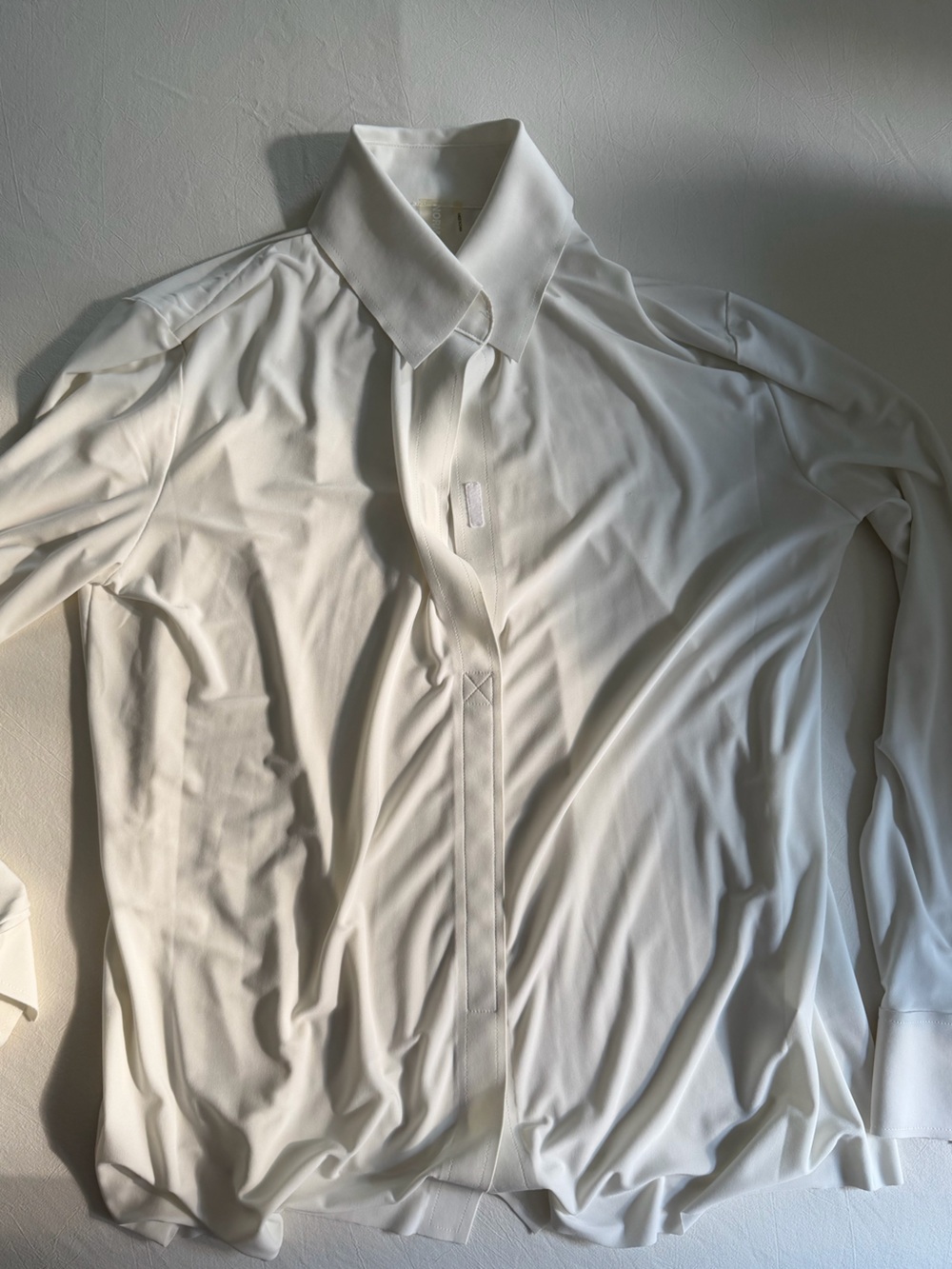 Norma Kamali white long sleeve button up blouse